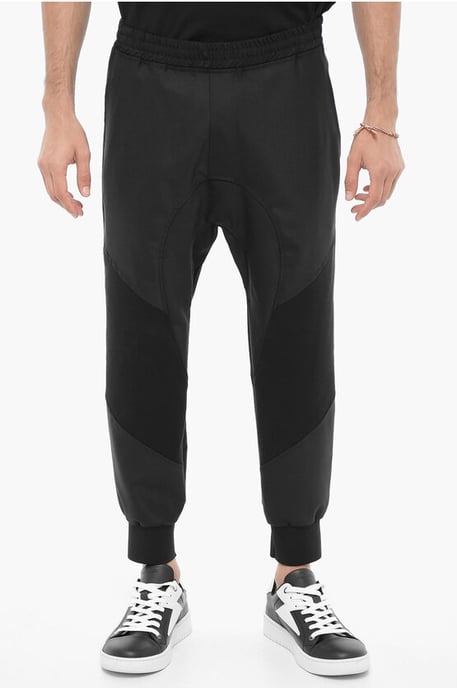 Pantalones casuales de mezcla de lana virgen de corte holgado en negro - Image 1