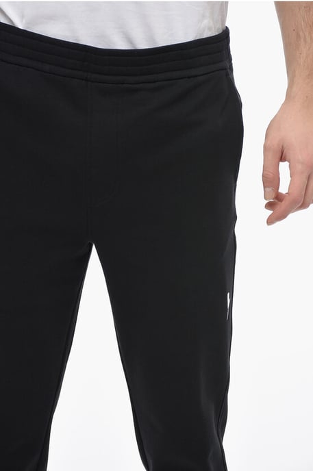 Pantalones deportivos ajustados de algodón con puños en negro - Image 3