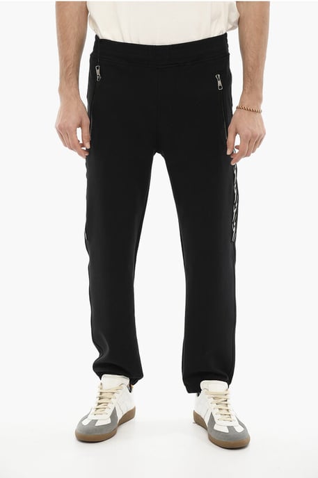 Joggers ajustados con estampado de rayos laterales en negro - Image 1