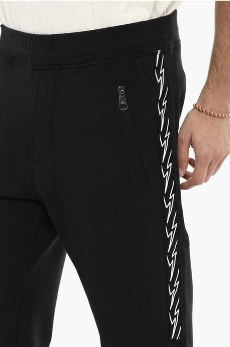 Joggers ajustados con estampado de rayos laterales en negro - Image 3