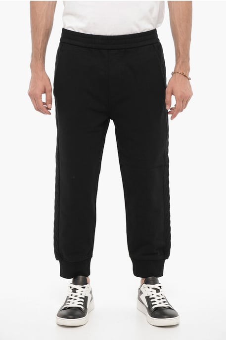 Joggers de color liso con bandas laterales de lana en negro - Image 1
