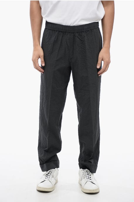 Pantalones REM de algodón arrugado en gris - Image 1