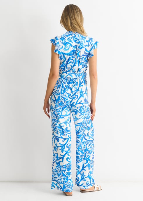 Mono con volantes florales azules - Image 4