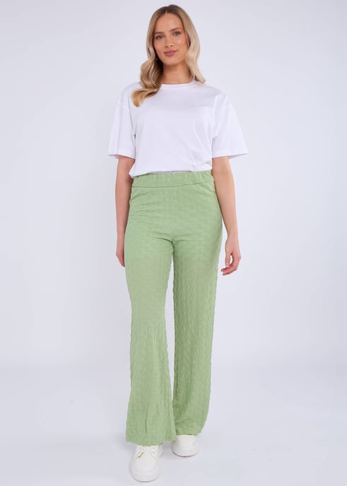Pantalones acampanados con cintura elástica y textura en verde salvia - Image 1