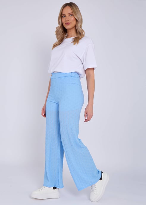 Pantalones acampanados con cintura elástica y textura azul cielo - Image 3