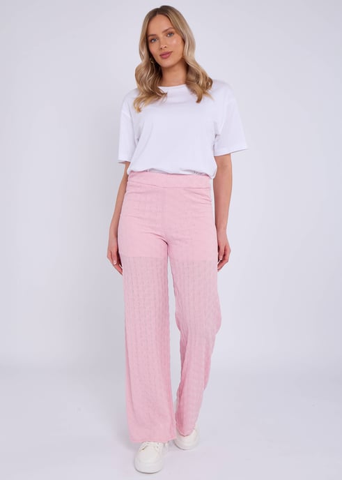 Pantalón acampanado rosa con textura y cintura elástica - Image 1
