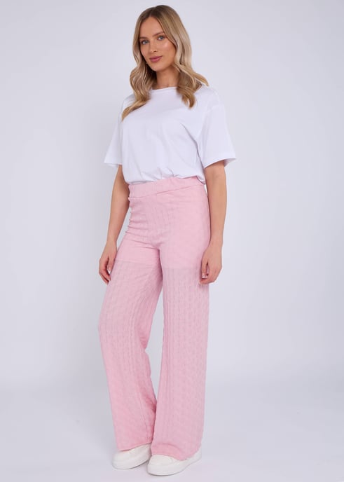 Pantalón acampanado rosa con textura y cintura elástica - Image 3