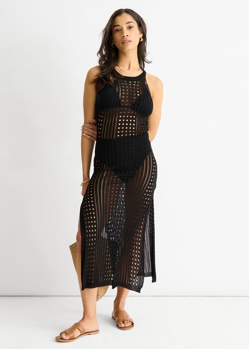Vestido negro de punto de ganchillo con aberturas - Image 1
