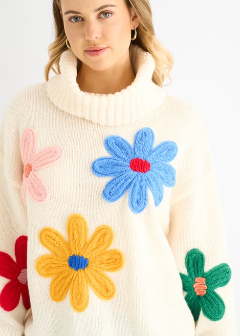 Jersey oversize con apliques florales en color crema - Image 2