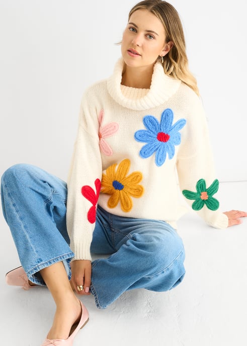 Jersey oversize con apliques florales en color crema - Image 3