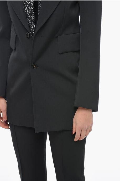 Blazer de lana elástica con mangas curvas en negro - Image 3