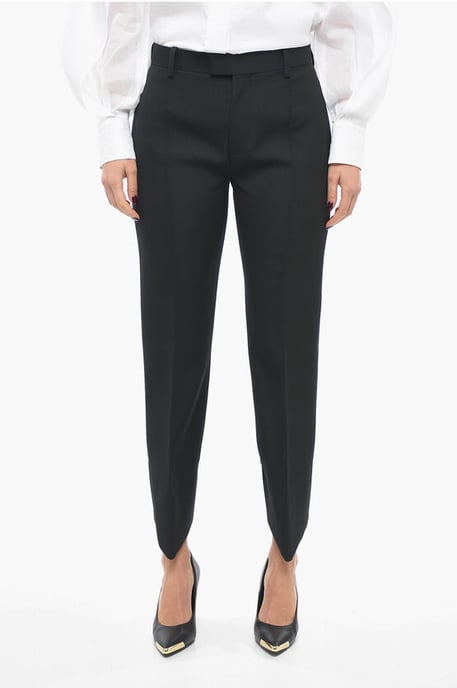 Pantalones de lana con pliegues delanteros y diseño curvo en negro - Image 1
