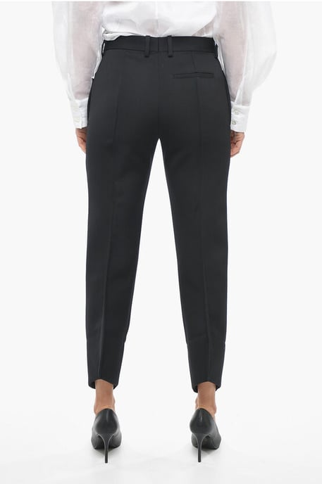Pantalones de lana con pliegues delanteros y diseño curvo en negro - Image 2