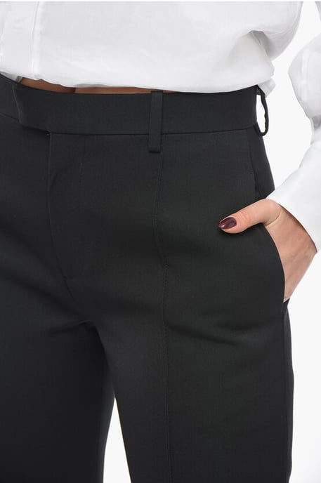 Pantalones de lana con pliegues delanteros y diseño curvo en negro - Image 3
