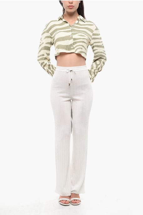Pantalones de lana virgen acanalados de cintura alta en blanco - Image 4
