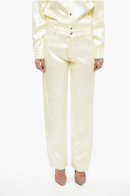 Pantalones holgados de mezcla de viscosa y seda en amarillo - Image 1