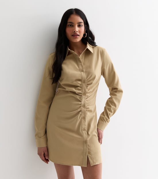 Vestido camisero asimétrico con pliegues en piedra - Image 1