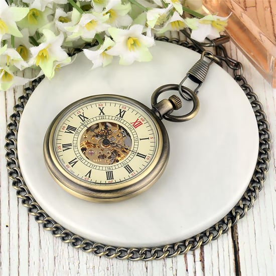Reloj de bolsillo antiguo con esqueleto mecánico de bronce y cara abierta - Image 4