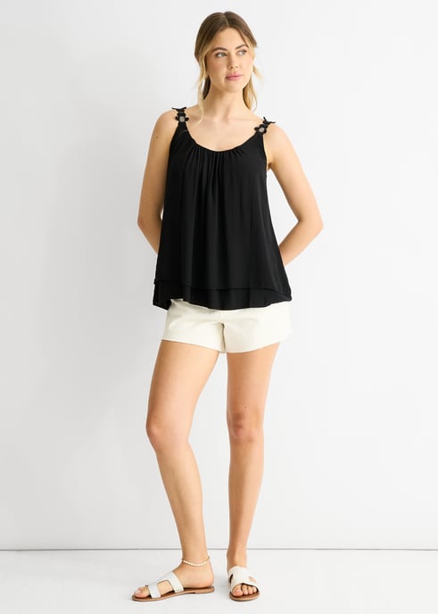 Top oversize con tirantes negros y estampado floral - Image 1