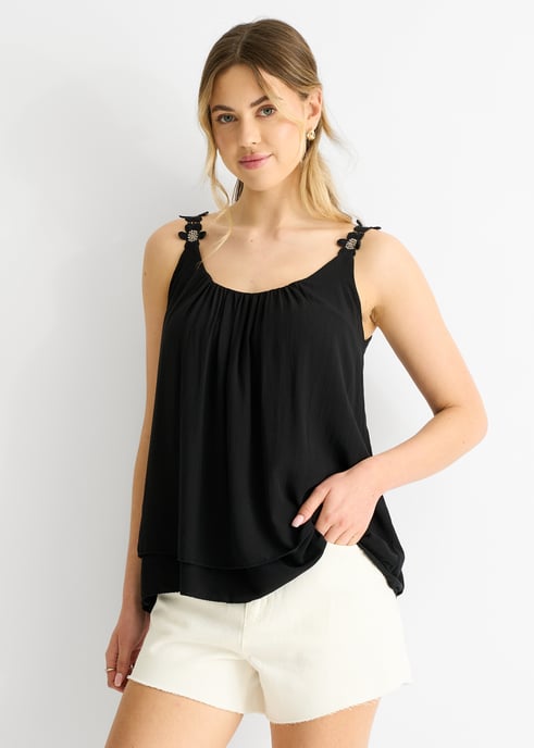 Top oversize con tirantes negros y estampado floral - Image 2