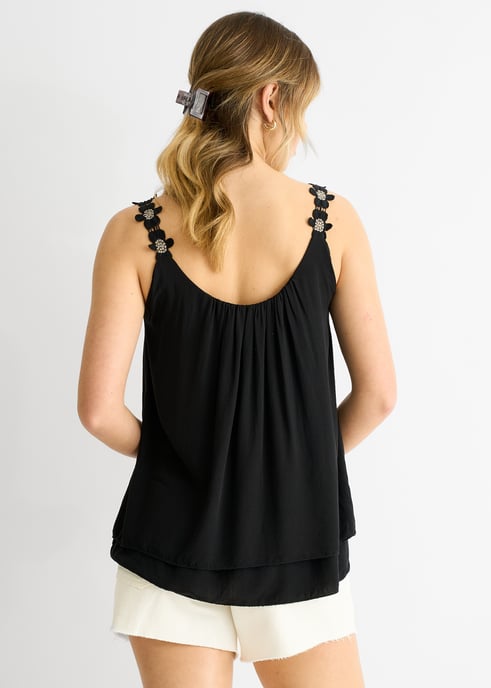 Top oversize con tirantes negros y estampado floral - Image 4