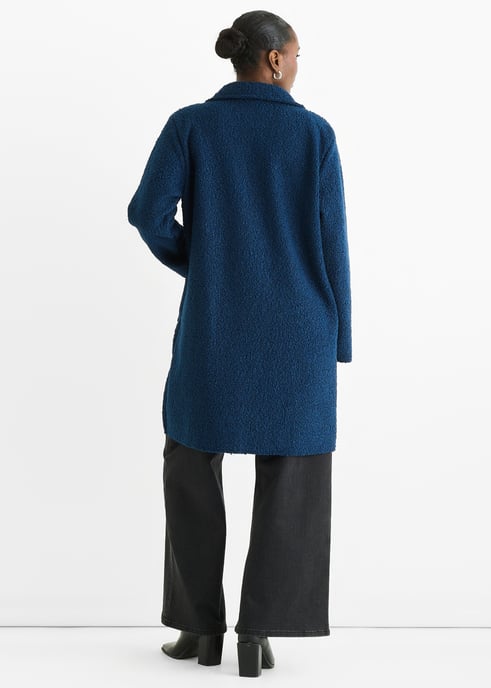 Chaqueta azul marino de doble botonadura y largo medio con forro de piel de oveja - Image 4