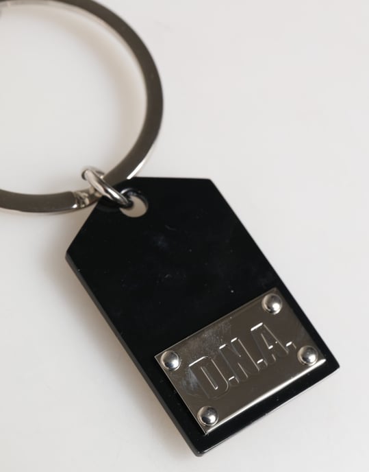 Placa de vidrio Sint negra con logo DG, llavero - Image 5