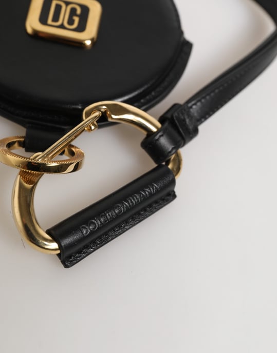 Monedero redondo de cuero negro con logo DG y cordón para llevar. - Image 3