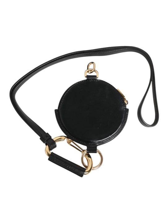 Monedero redondo de cuero negro con logo DG y cordón para llevar. - Image 4