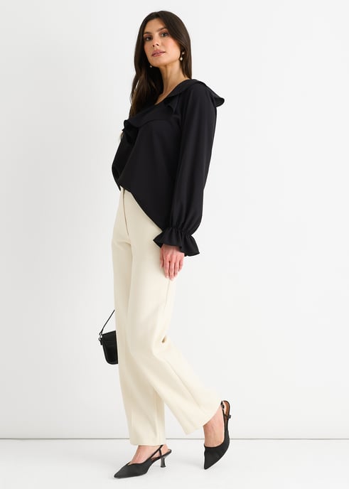Blusa holgada con volantes anchos negros - Image 3