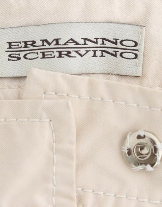 Pantalones Beiges Con Pliegues y Puños - Image 6