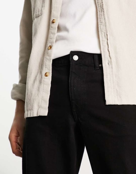 ASOS DESIGN tapered fit jeans i svart tvätt med knäsprickor - SVART - Image 3