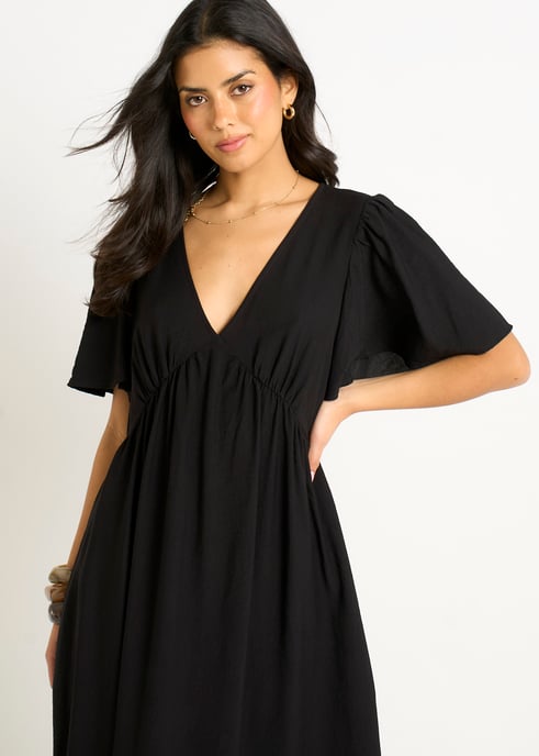 Vestido largo skater negro con cuello en V y mangas acampanadas - Image 2