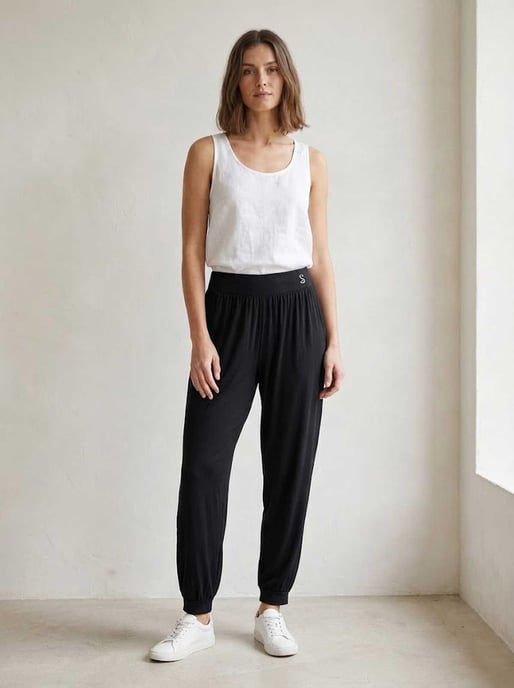 Pantalones deportivos negros holgados con cintura elástica - Image 2