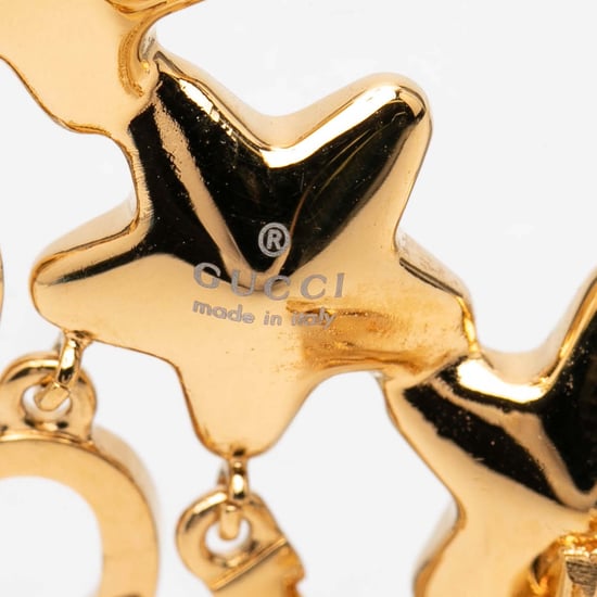 Pendiente de oreja de cristal en forma de estrella dorado, de segunda mano - Image 3