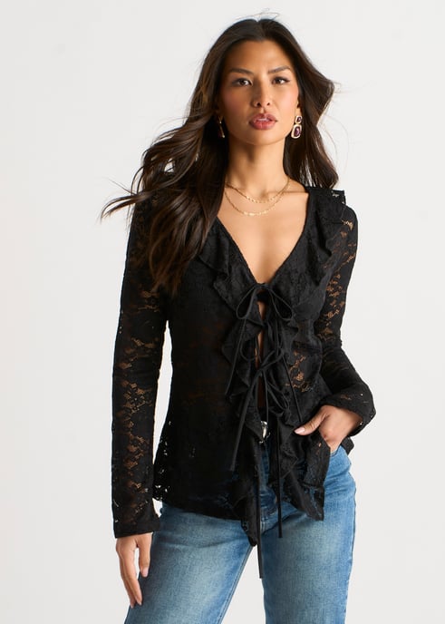 Blusa negra de encaje con volantes y lazo delantero - Image 1