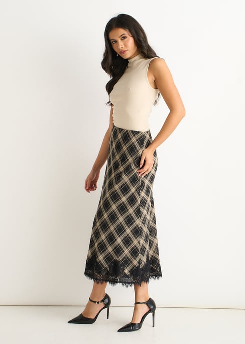 Falda sesgada de encaje con contraste y estampado monocromático - Image 3