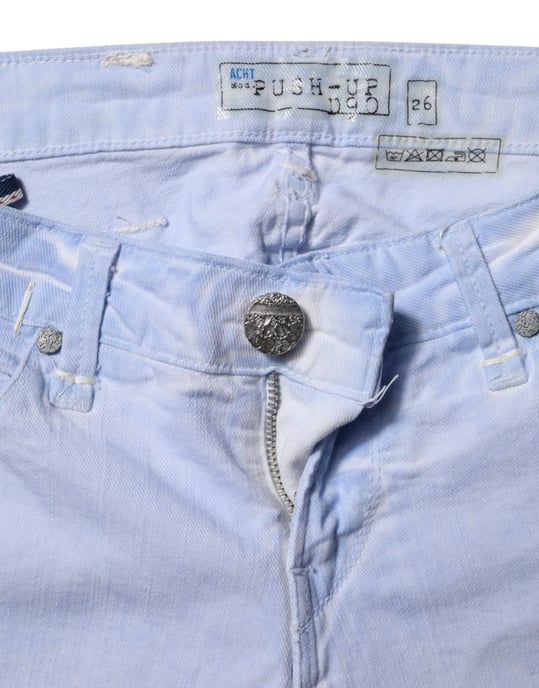 Jeans de mezclilla ajustados de algodón azul claro de tiro bajo Acht - Image 4