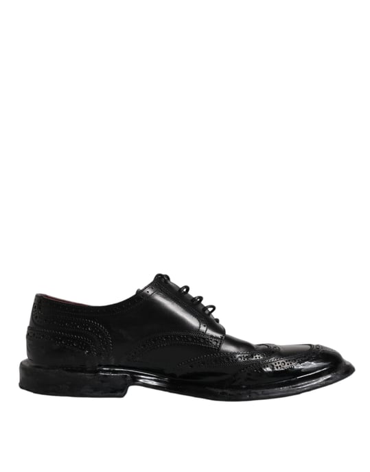 Zapatos formales Derby de ala brogue de cuero negro de Dolce & Gabbana - Image 1
