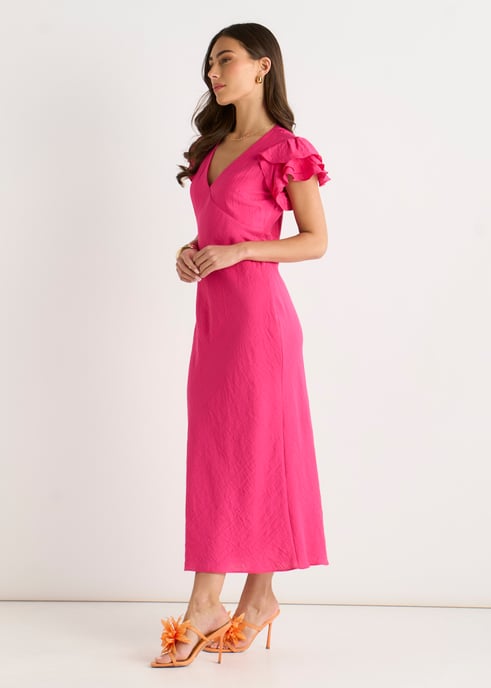Vestido midi rosa con cuello en V, volantes y corte al bies - Image 3