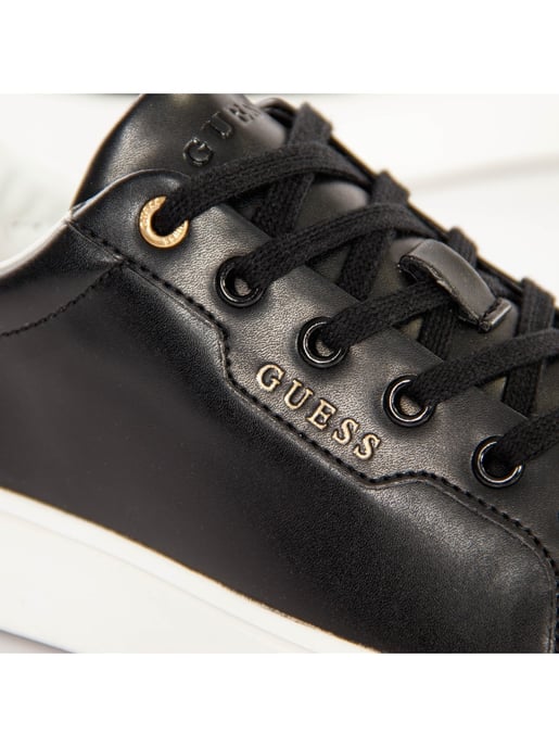 Zapatillas clásicas Guess para mujer con diseño triangular dorado - Image 3