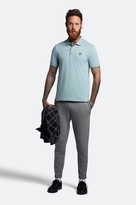 Polo azul de segunda equipacion con logo en el pecho y la marca Lyle & Scott - Image 3