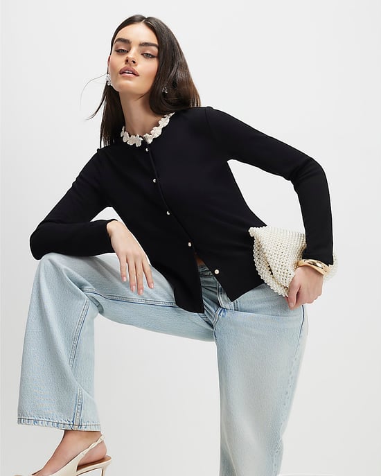 River Island Top de mujer Negro Manga larga Adorno floral - Image 1