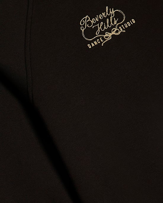 Sudadera negra para niña River Island con detalle de cremallera en la espalda - Image 4