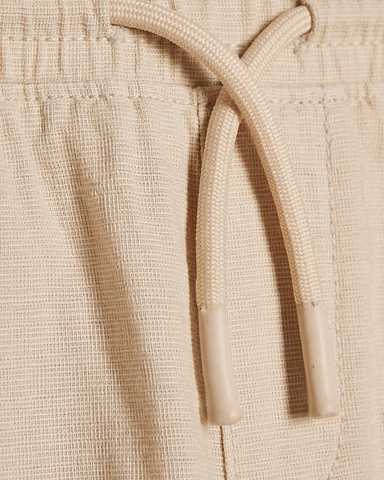 River Island Pantalón beige para niño Mini de cintura elástica con cordón - Image 2