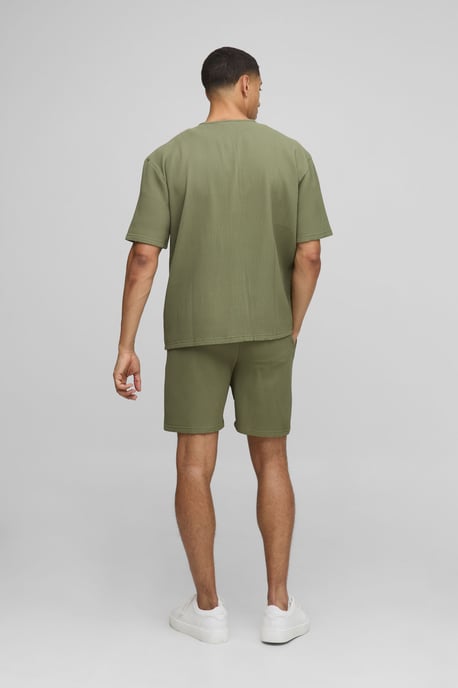 Camisa oversize sin cuello con pliegues y manga corta - Image 2
