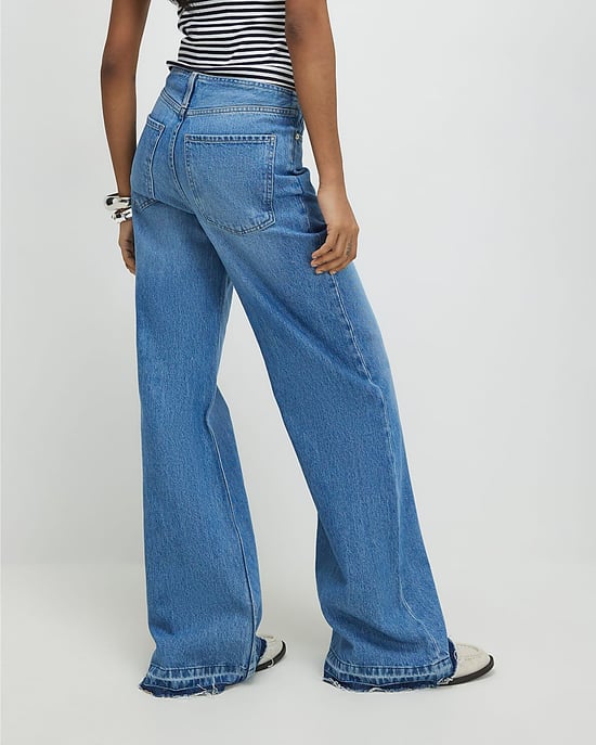 River Island Vaqueros de mujer de pierna ancha, azules, con dobladillo vuelto y cintura limpia - Image 3