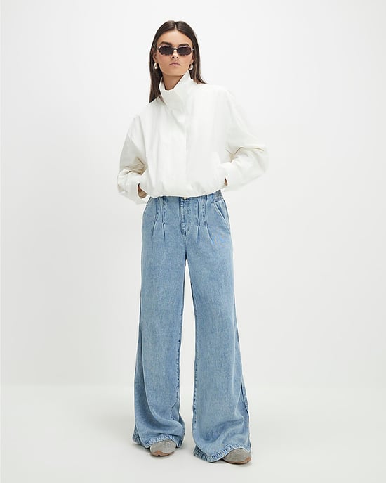 River Island Vaqueros de mujer de pierna ancha azules con pinzas elásticas delanteras - Image 1