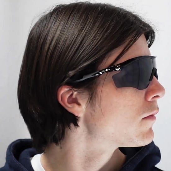Gafas de sol Oakley Wrap para hombre en negro pulido con lente Prizm carretera - Image 5