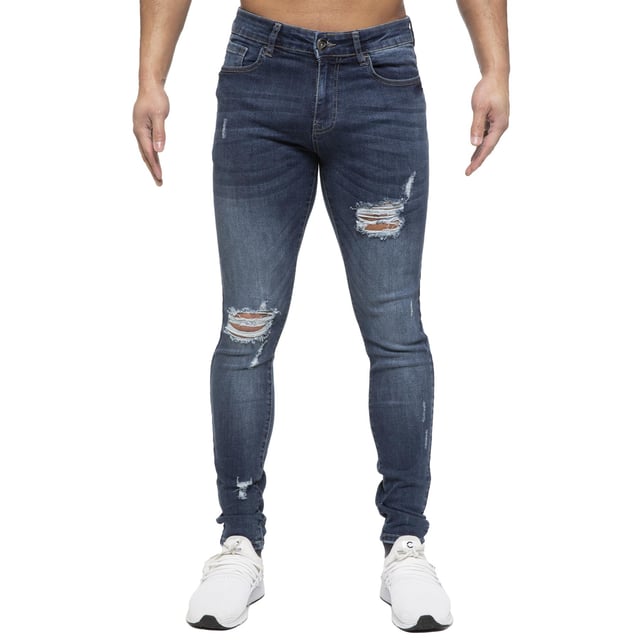 Vaqueros ajustados rotos discount hombre
